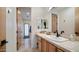 Bathroom with single sink vanity and access to hallway at 12824 E Jenan Dr, Scottsdale, AZ 85259