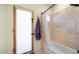 Bathroom with tub, shower, and exterior access at 12824 E Jenan Dr, Scottsdale, AZ 85259