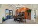 Elegant dining room with built-in shelving and chandelier at 12824 E Jenan Dr, Scottsdale, AZ 85259