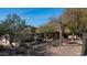 Lovely desert landscaping surrounds this charming home's entrance at 12824 E Jenan Dr, Scottsdale, AZ 85259