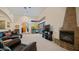 Living room features a fireplace and an open floor plan at 12824 E Jenan Dr, Scottsdale, AZ 85259