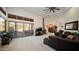 Open living area showcasing sliding glass doors to the backyard at 12824 E Jenan Dr, Scottsdale, AZ 85259