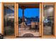 View of backyard oasis through sliding glass doors at 12824 E Jenan Dr, Scottsdale, AZ 85259