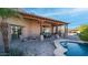 Large covered patio with pool and seating area at 12824 E Jenan Dr, Scottsdale, AZ 85259