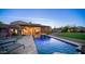 Inviting pool area with flagstone patio and lounge chairs at 12824 E Jenan Dr, Scottsdale, AZ 85259