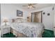 Charming bedroom with floral bedding and a ceiling fan at 1313 W Glenmere Dr, Chandler, AZ 85224