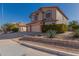 Two-story house with three-car garage and landscaped yard at 1313 W Glenmere Dr, Chandler, AZ 85224