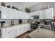 Kitchen with white cabinets, granite countertops, and stainless steel appliances at 1313 W Glenmere Dr, Chandler, AZ 85224