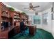 Home office with built-in wooden bookcases at 1313 W Glenmere Dr, Chandler, AZ 85224