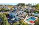 An aerial view showcasing a home's backyard oasis, complete with a refreshing pool and relaxing patio at 13232 N 54Th Dr, Glendale, AZ 85304