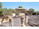 Built-in outdoor kitchen with BBQ and ample counter space at 13232 N 54Th Dr, Glendale, AZ 85304