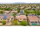 Aerial view showcasing the house's location in a residential area at 15296 W Coolidge St, Goodyear, AZ 85395