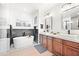 Elegant bathroom with double vanity and a freestanding bathtub at 16328 E Ridgeline Dr, Fountain Hills, AZ 85268