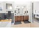 Bathroom with double vanity and a stylish soaking tub at 16328 E Ridgeline Dr, Fountain Hills, AZ 85268