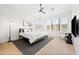 Bright bedroom with a king bed and plantation shutters at 16328 E Ridgeline Dr, Fountain Hills, AZ 85268