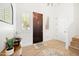 Bright entryway with wood-look tile floors, and an attractive door at 16328 E Ridgeline Dr, Fountain Hills, AZ 85268