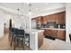 Gourmet kitchen with island, stainless steel appliances, and dark wood cabinetry at 16328 E Ridgeline Dr, Fountain Hills, AZ 85268