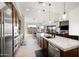 Modern kitchen with stainless steel appliances and marble countertops at 16328 E Ridgeline Dr, Fountain Hills, AZ 85268