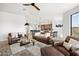 Open living area with leather sofas and views into the kitchen at 16328 E Ridgeline Dr, Fountain Hills, AZ 85268