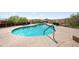 Community pool with surrounding patio furniture at 16328 E Ridgeline Dr, Fountain Hills, AZ 85268