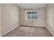 Neutral bedroom with large window letting in natural light at 1638 E Sandra Ter, Phoenix, AZ 85022