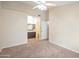 Bedroom leading into a full bathroom featuring a sink, mirror, and toilet at 1638 E Sandra Ter, Phoenix, AZ 85022