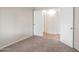 Neutral bedroom featuring carpet and doorway to adjoining room at 1638 E Sandra Ter, Phoenix, AZ 85022