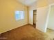 Simple bedroom with carpet and window at 1638 E Sandra Ter, Phoenix, AZ 85022