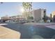 Condo building with palm trees and parking spaces at 1645 W Baseline Rd # 2075, Mesa, AZ 85202