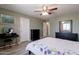 Bright bedroom with a comfortable bed, dresser, and vanity at 16636 S 34Th Way, Phoenix, AZ 85048