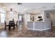 Kitchen with white cabinets, granite countertops, and an island at 16636 S 34Th Way, Phoenix, AZ 85048