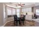 Kitchen nook with a round table and chairs, white cabinets at 16636 S 34Th Way, Phoenix, AZ 85048