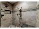 Large walk-in shower with stone tile and pebble floor at 16636 S 34Th Way, Phoenix, AZ 85048