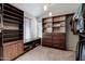 Spacious walk-in closet with ample shelving and drawers at 16636 S 34Th Way, Phoenix, AZ 85048