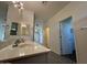 Vanity with double sinks and mirror in a bathroom at 1727 W Pollack St, Phoenix, AZ 85041