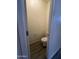 Small half bathroom with toilet and tile floor at 1727 W Pollack St, Phoenix, AZ 85041