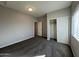 Bedroom with carpet, closet, and window at 1727 W Pollack St, Phoenix, AZ 85041