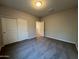 Bright bedroom featuring double closets and carpet flooring at 1727 W Pollack St, Phoenix, AZ 85041