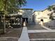 Two story house with gray exterior and wooden gate at 1727 W Pollack St, Phoenix, AZ 85041