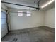 Spacious garage with overhead door and ample storage space at 1727 W Pollack St, Phoenix, AZ 85041