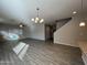 Bright living room featuring tile floors and a ceiling fan at 1727 W Pollack St, Phoenix, AZ 85041