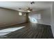 Spacious living room with tile flooring and ceiling fan at 1727 W Pollack St, Phoenix, AZ 85041