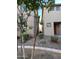 Narrow gravel walkway between two houses at 1727 W Pollack St, Phoenix, AZ 85041