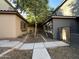 Landscaped walkway between two houses at 1727 W Pollack St, Phoenix, AZ 85041