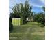 Landscaped backyard with shed and mature trees offering ample space at 178 W Harrison St, Chandler, AZ 85225