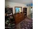 Bedroom featuring a large dresser and bookcases at 178 W Harrison St, Chandler, AZ 85225