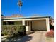 Brightly painted home with a covered entryway and a well-maintained landscape at 178 W Harrison St, Chandler, AZ 85225