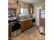 Fully equipped kitchen with ample counter space and wood cabinets at 178 W Harrison St, Chandler, AZ 85225