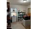 Well-organized storage room with shelving and stained glass window at 178 W Harrison St, Chandler, AZ 85225