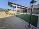 Beautiful backyard with pool, pergola, artificial grass, gravel, and desert landscaping at 18404 W Long Lake Rd, Goodyear, AZ 85338